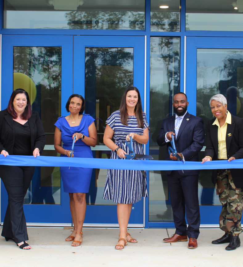 Community leaders at the AYI ribbon cutting